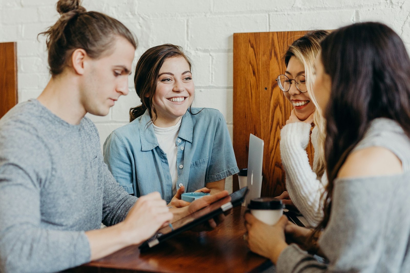 People connecting and exchanging ideas in a bright social setting